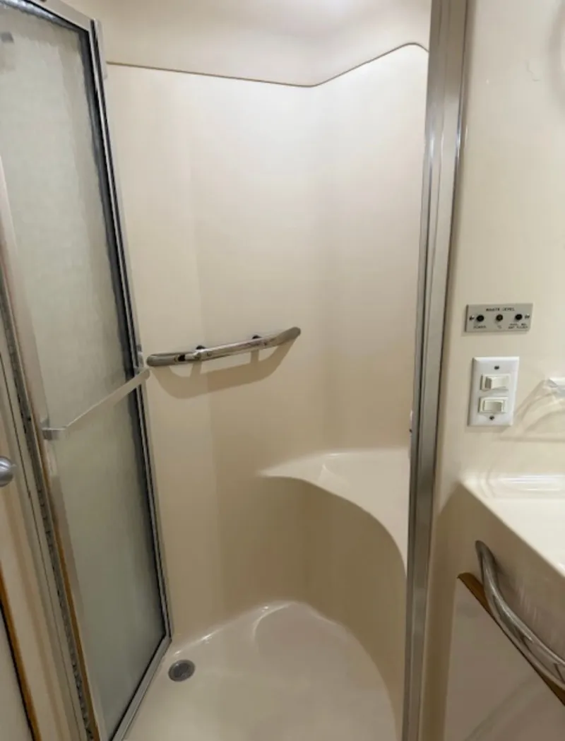 Slide: The Image of Shower in 1996 Sea Ray 440 Express Bridge boat. - 26
