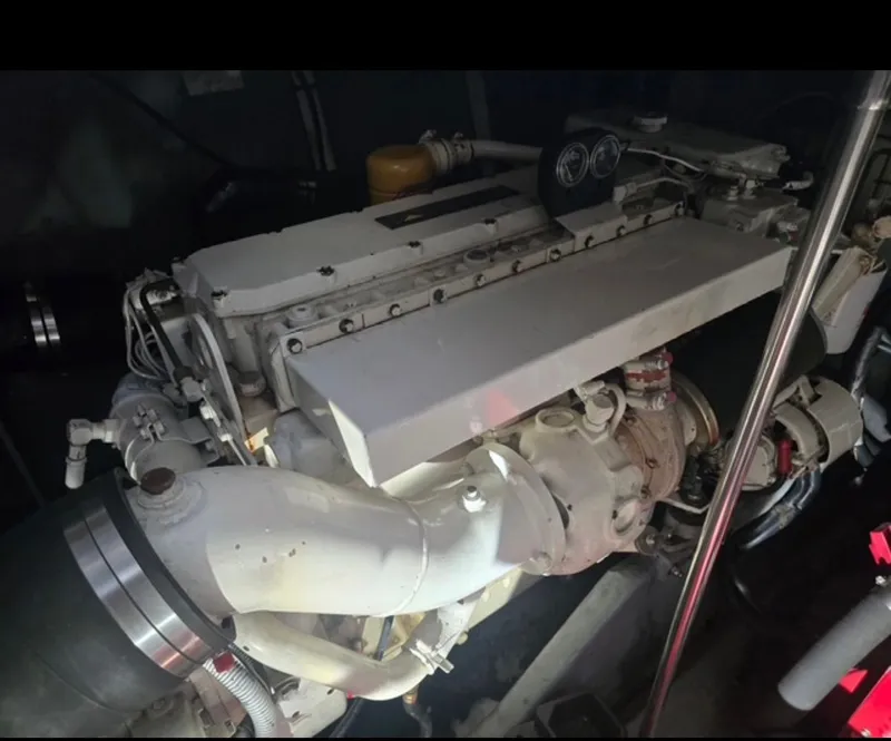 Slide: The Image of Engine room of 1996 Sea Ray 440 Express Bridge. - 32