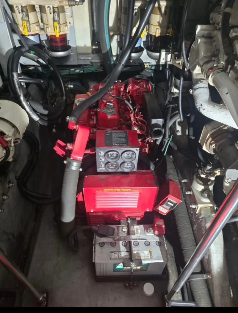 Slide: The Image of Engine room of 1996 Sea Ray 440 Express Bridge. - 35