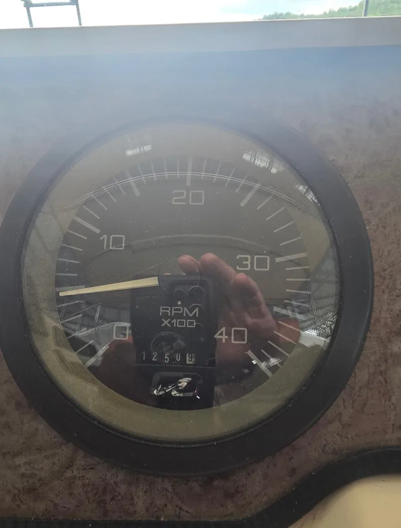 Slide: The Image of Tachometer of a 1996 Sea Ray 440 Express Bridge boat. - 38