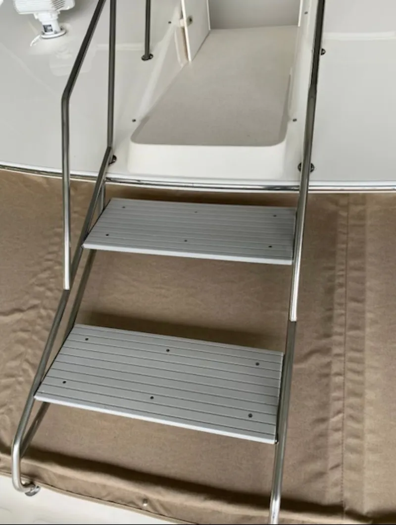 Slide: The Image of Stairs of 1996 Sea Ray 440 Express Bridge. - 9