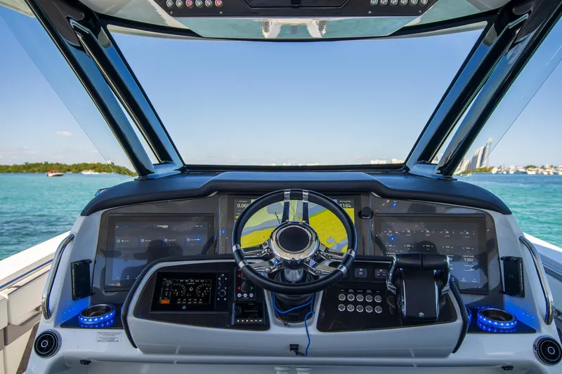 Slide: The Image of Cockpit view of 2023 MTI 50v boat with advanced navigation system. - 10