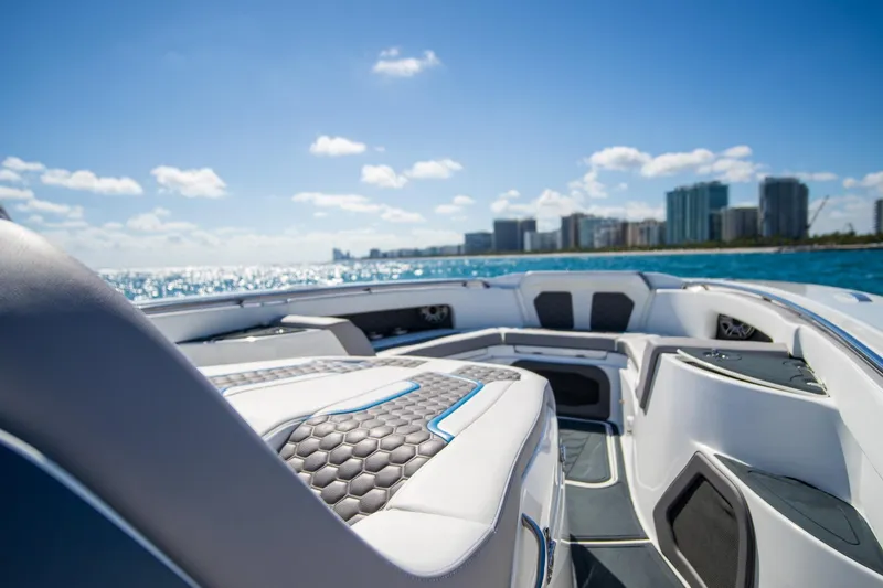 Slide: The Image of Luxurious MTI 50v boat interior with city skyline and ocean view, 2023 model. - 14