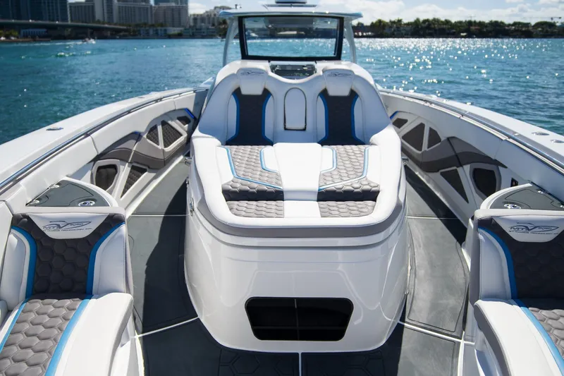 Slide: The Image of Luxurious 2023 MTI 50v boat interior with stylish seating on a sunny day. - 32