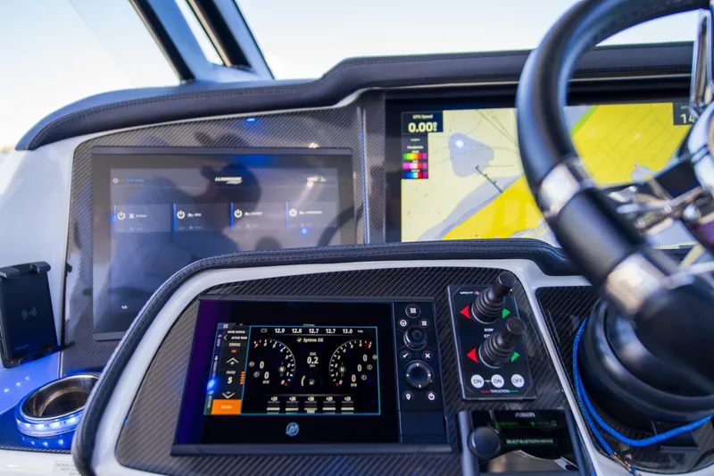 Slide: The Image of Dashboard of 2023 MTI 50v boat with advanced navigation and control systems. - 36