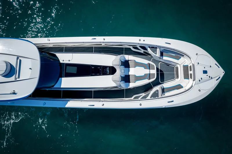 Slide: The Image of Aerial view of 2023 MTI 50v luxury boat on clear blue water. - 49