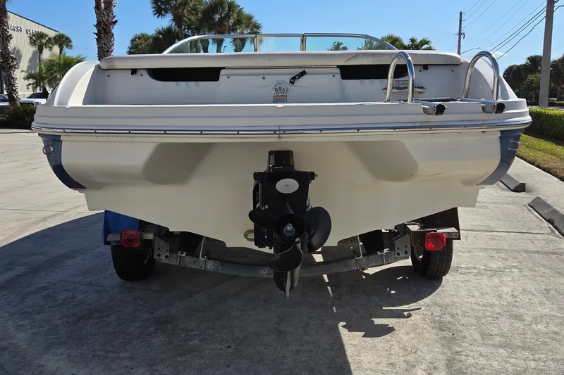Slide: The Image of 2004 Sea Ray 200 Sport boat on trailer, rear view, sunny day. - 3