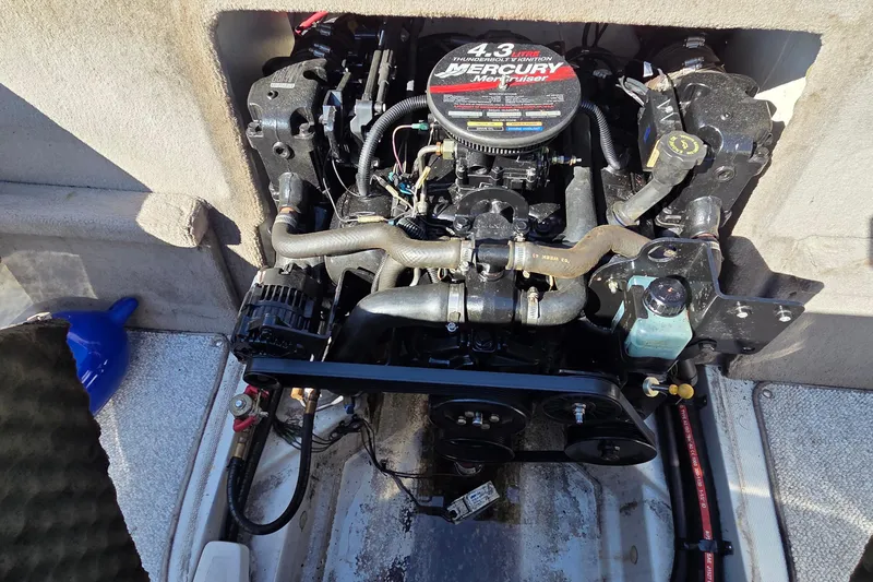 Slide: The Image of Engine compartment of a 2004 Sea Ray 200 Sport with Mercury MerCruiser 4.3L engine. - 7