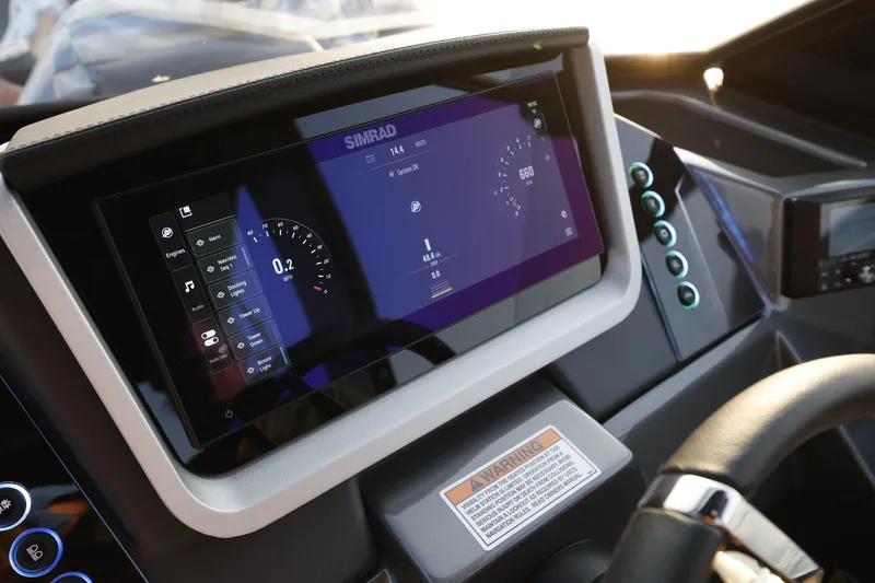 Slide: The Image of Dashboard of 2025 Sylvan M5 CLZ DC boat with digital display and controls. - 23