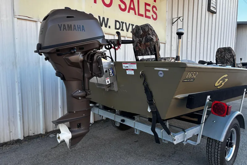 Slide: The Image of 2025 G3 Gator Tough 1652 VBW boat with Yamaha outboard motor on trailer. - 24