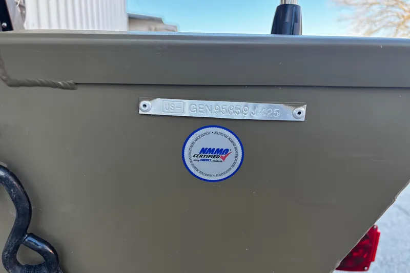 Slide: The Image of 2025 G3 Gator Tough 1652 VBW boat with certification label and serial number plate. - 25