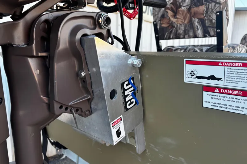 Slide: The Image of 2025 G3 Gator Tough 1652 VBW boat motor mount with safety warnings. - 26