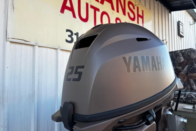 Slide: The Image of Yamaha 25 outboard motor on 2025 G3 Gator Tough 1652 VBW boat, outdoor setting. - 27