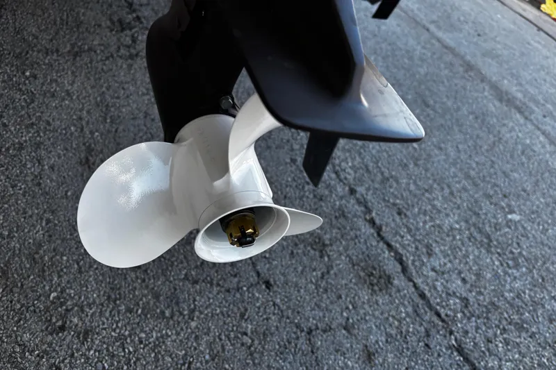 Slide: The Image of 2025 G3 Gator Tough 1652 VBW boat propeller on asphalt surface. - 29