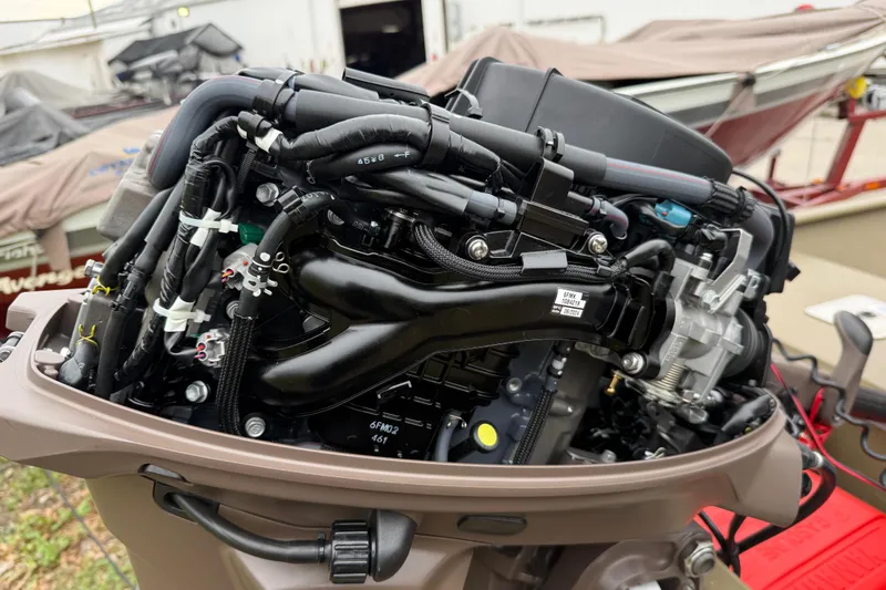 Slide: The Image of 2025 G3 Gator Tough 1652 VBW boat engine close-up, showcasing intricate mechanical details. - 4