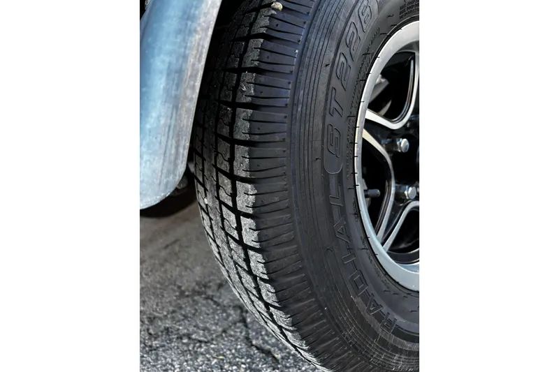 Slide: The Image of Close-up of a tire on a 2025 G3 Gator Tough 1652 VBW boat trailer. - 40