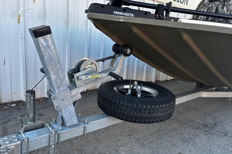 Slide: The Image of 2025 G3 Gator Tough 1652 VBW boat trailer with spare tire and winch system. - 60
