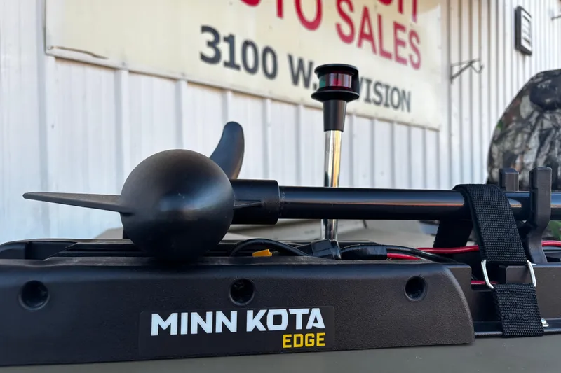 Slide: The Image of Minn Kota Edge motor on 2025 G3 Gator Tough 1652 VBW boat, outdoor sales location. - 61