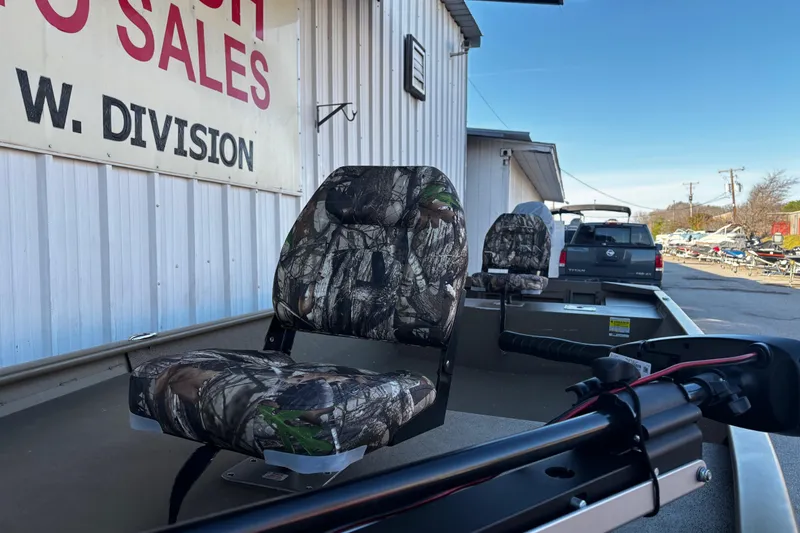 Slide: The Image of 2025 G3 Gator Tough 1652 VBW boat with camo seats at dealership. - 62