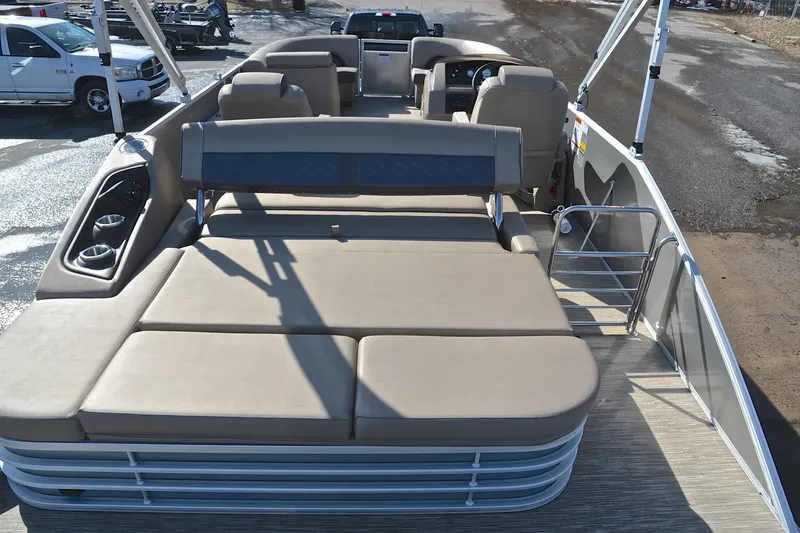 Slide: The Image of 2023 Bennington L23 pontoon boat with spacious seating and modern design. - 18