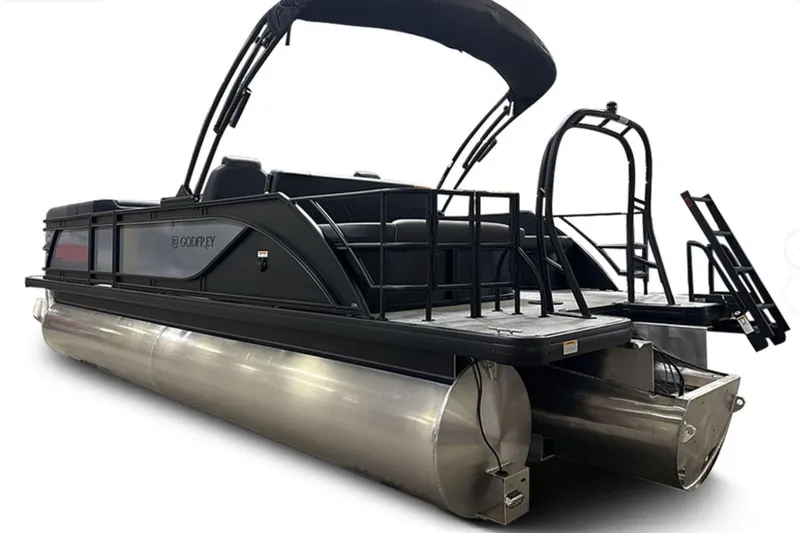 Slide: The Image of 2026 Godfrey Sweetwater 22' Tritoon with single flip lounge, sleek black design. - 32
