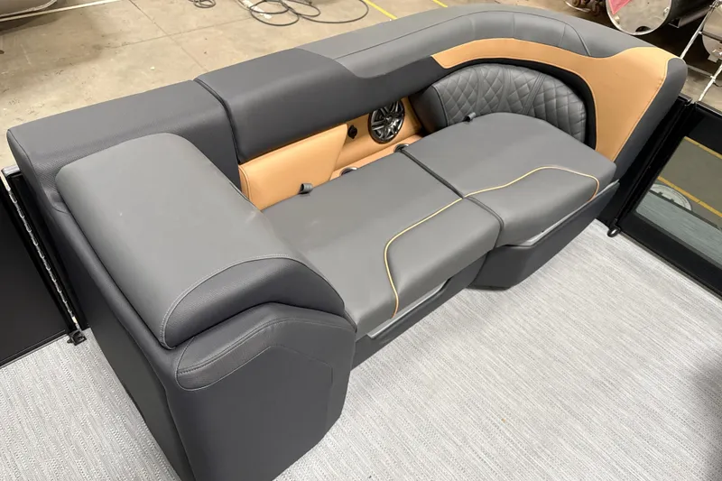 Slide: The Image of 2026 Godfrey Sweetwater 22' Tritoon lounge seat with sleek gray and tan upholstery. - 44