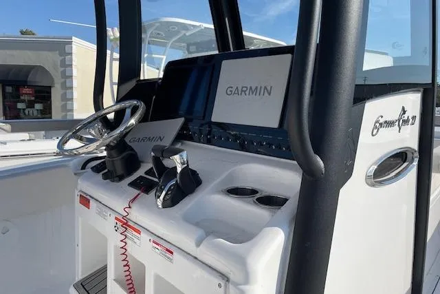 Slide: The Image of 2026 Sea Hunt Gamefish 27 Coffin Box boat console with Garmin navigation system. - 5