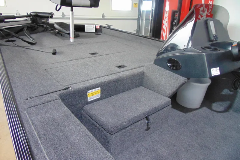 Slide: The Image of 2026 Crestliner 1700 Storm boat interior with seating and control panel. - 6