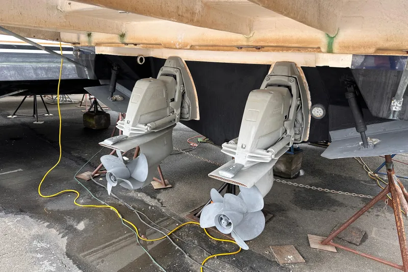 Slide: The Image of 2016 Regal 35 Sport Coupe boat propellers and drives on dry dock. - 22