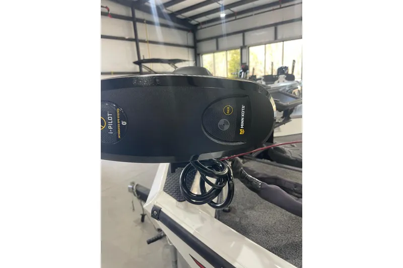 Slide: The Image of 2018 Ranger RT198P boat with Minn Kota i-Pilot trolling motor in a garage. - 10