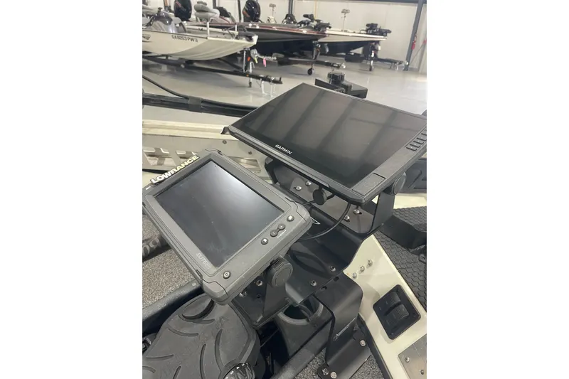 Slide: The Image of 2018 Ranger RT198P boat with Lowrance and Garmin navigation displays. - 11
