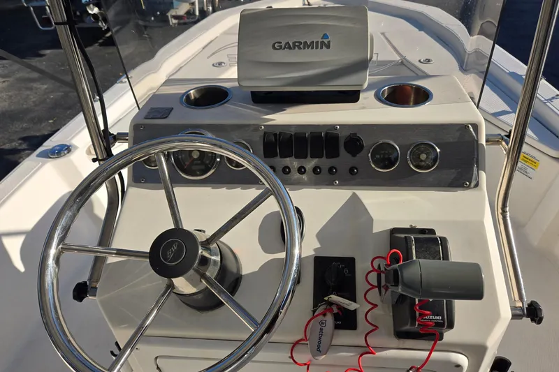Slide: The Image of 2016 Blue Wave 1900 STL boat console with Garmin GPS and steering wheel. - 10