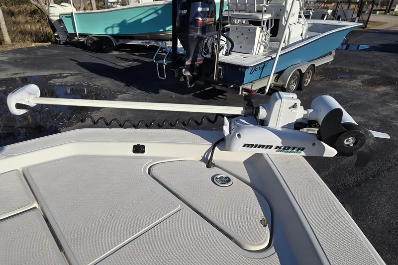 Slide: The Image of 2016 Blue Wave 1900 STL boat with Minn Kota trolling motor on deck. - 12