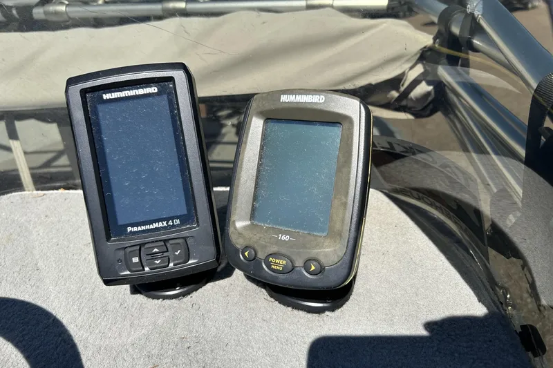 Slide: The Image of Two Humminbird fish finders on a Monark Vision 1601 SC, 2009 model. - 5