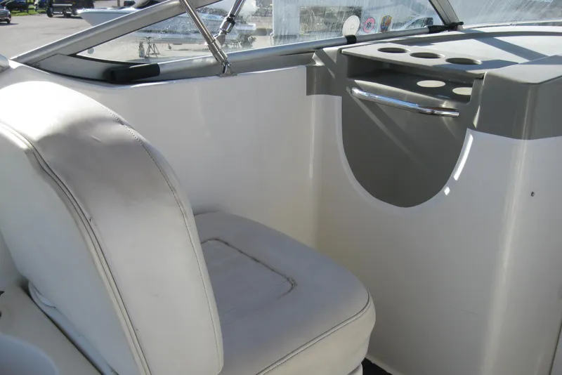 Slide: The Image of Interior view of a 2000 Bayliner 3055 Ciera Sunbridge DX/LX boat cockpit seat. - 11