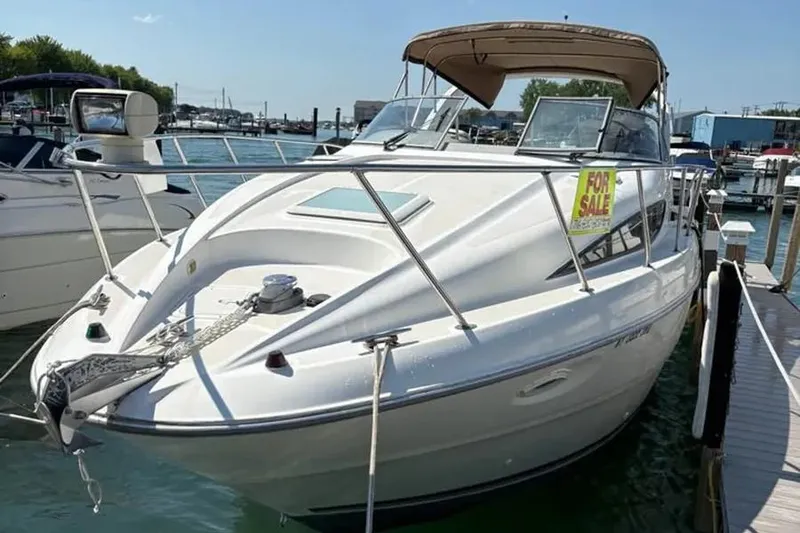 Slide: The Image of 2000 Bayliner 3055 Ciera Sunbridge DX/LX boat for sale at marina dock. - 25