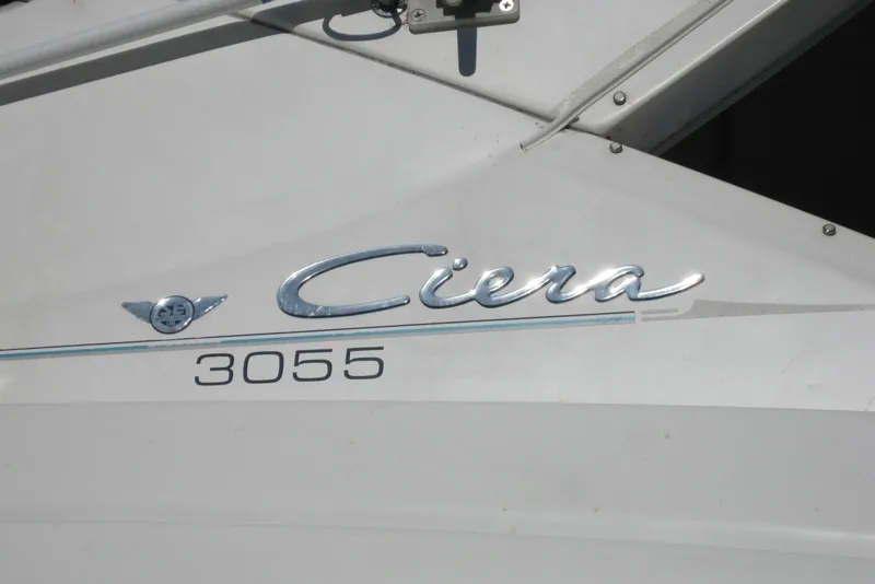 Slide: The Image of Bayliner 3055 Ciera Sunbridge DX/LX 2000 model boat nameplate. - 6