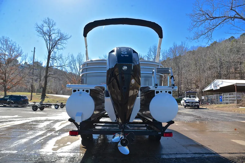 Slide: The Image of 2024 Sun Tracker Party Barge 22 XP3 pontoon boat on trailer, rear view. - 14