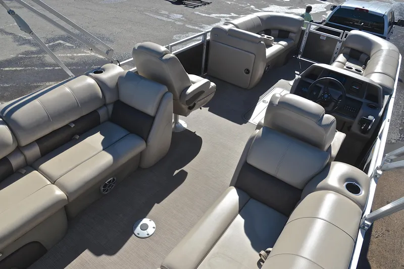 Slide: The Image of 2024 Sun Tracker Party Barge 22 XP3 interior with spacious seating and modern helm. - 20
