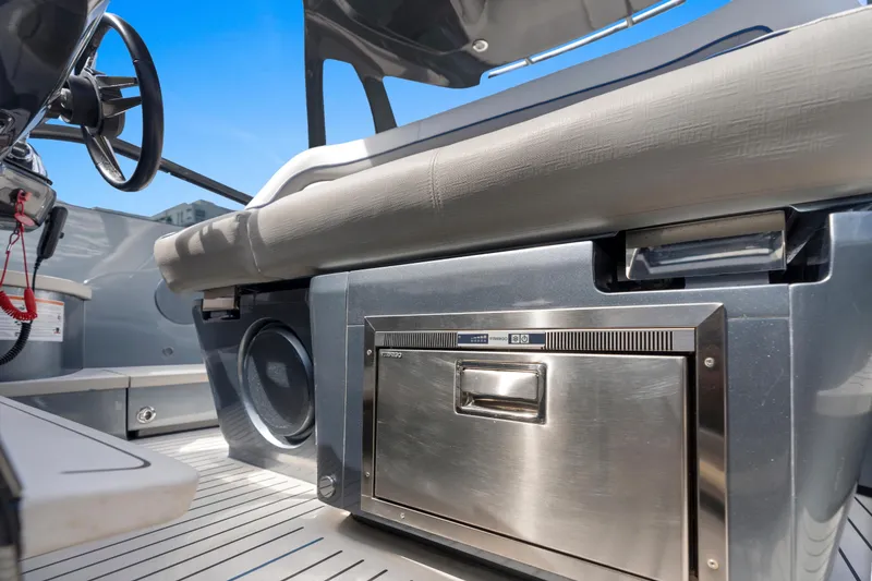 Slide: The Image of Interior of 2020 Princess R35 yacht, featuring a sleek stainless steel appliance and modern design. - 19