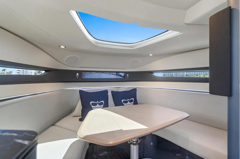 Slide: The Image of Luxurious interior of 2020 Princess R35 yacht with skylight and elegant seating area. - 21
