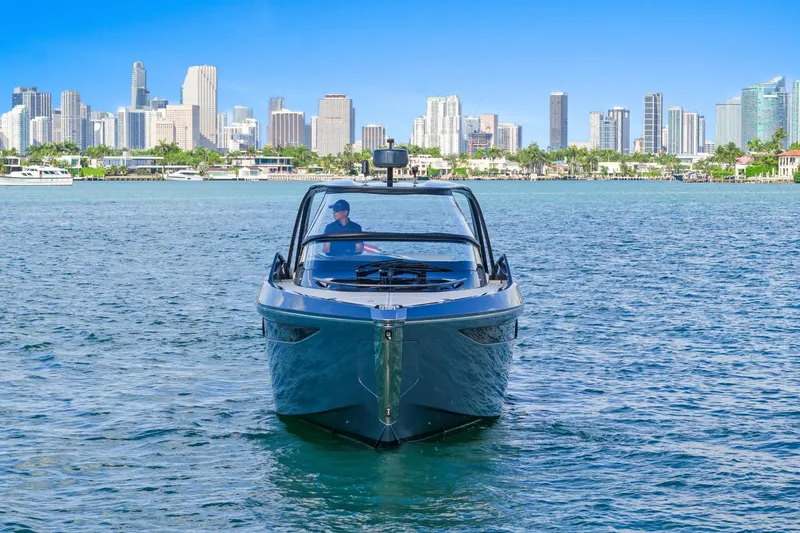 Slide: The Image of 2020 Princess R35 yacht cruising near city skyline on a sunny day. - 6