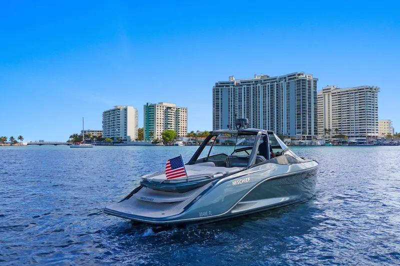 Slide: The Image of Luxury Princess R35 yacht on water, city skyline backdrop, 2020 model. - 8