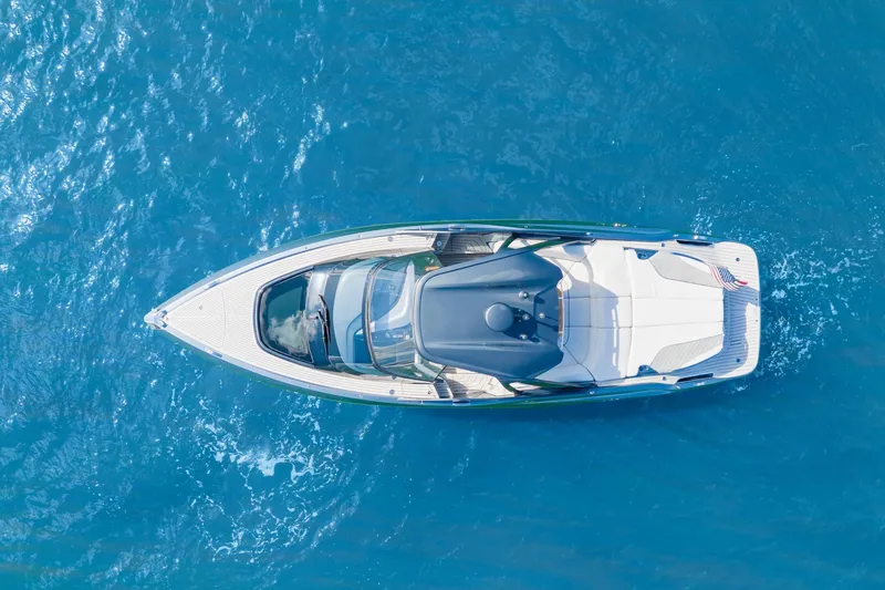 Slide: The Image of Aerial view of 2020 Princess R35 yacht cruising on clear blue water. - 9