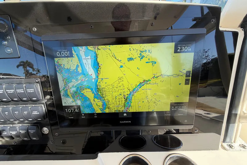 Slide: The Image of Garmin GPS display on 2016 Cobia 344 Center Console boat dashboard. - 17
