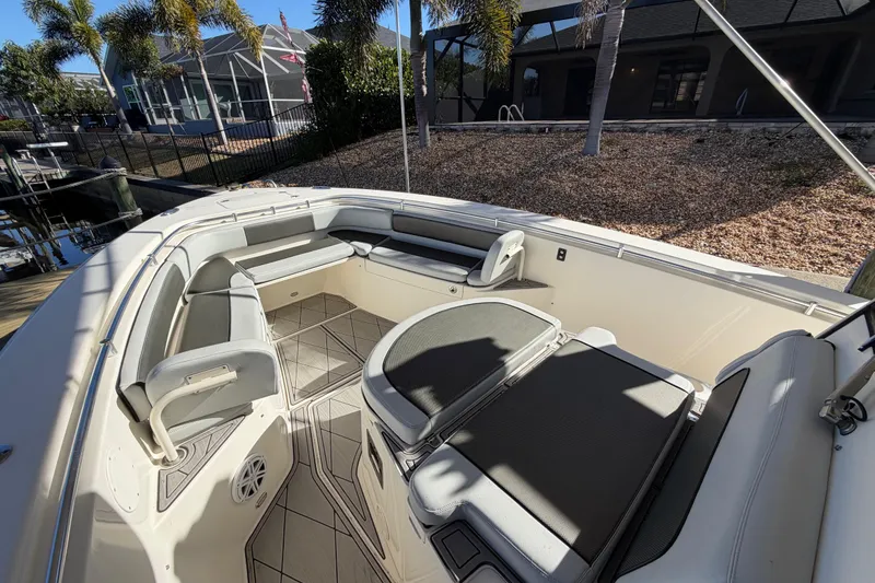 Slide: The Image of 2016 Cobia 344 Center Console boat with spacious seating and modern design. - 25