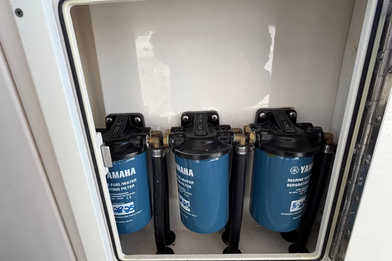 Slide: The Image of Yamaha marine fuel/water separating filters in 2016 Cobia 344 Center Console boat. - 35