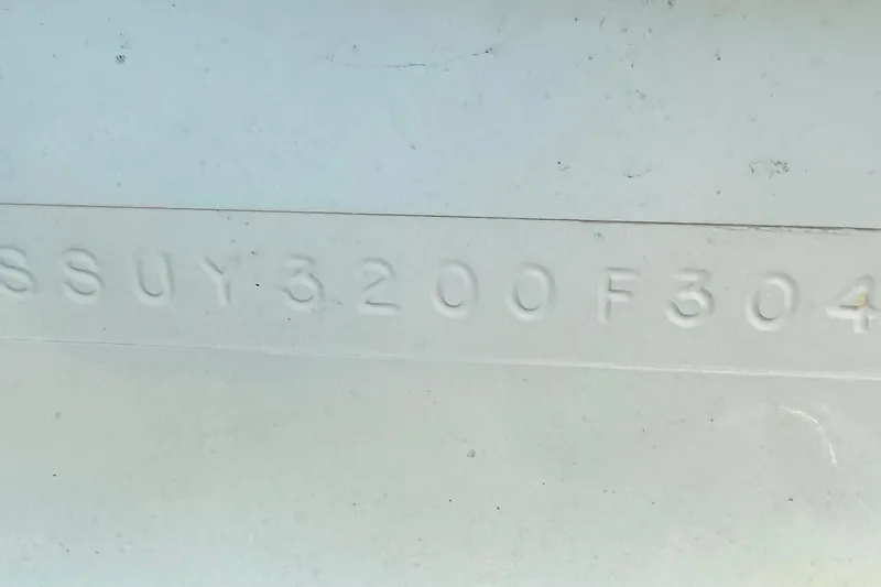 Slide: The Image of Hull identification number on 2004 Pursuit 3070 Offshore boat. - 102