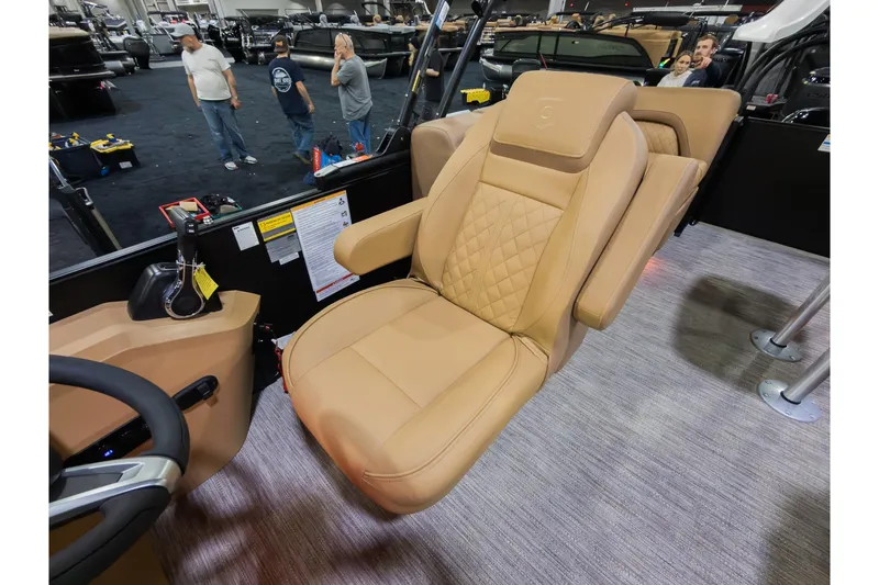 Slide: The Image of Luxurious tan seating on 2026 Godfrey Sweetwater 22' Split Bench Tritoon boat. - 12