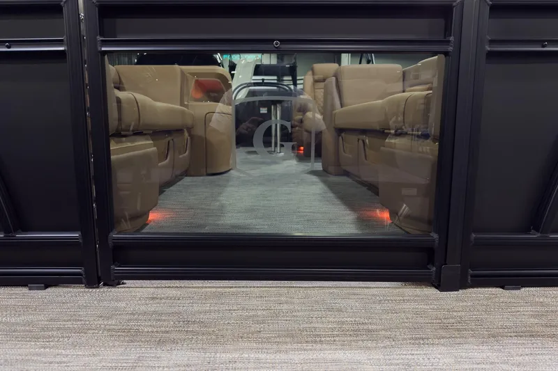 Slide: The Image of Interior view of 2026 Godfrey Sweetwater 22' Split Bench Tritoon, showcasing luxurious seating. - 2